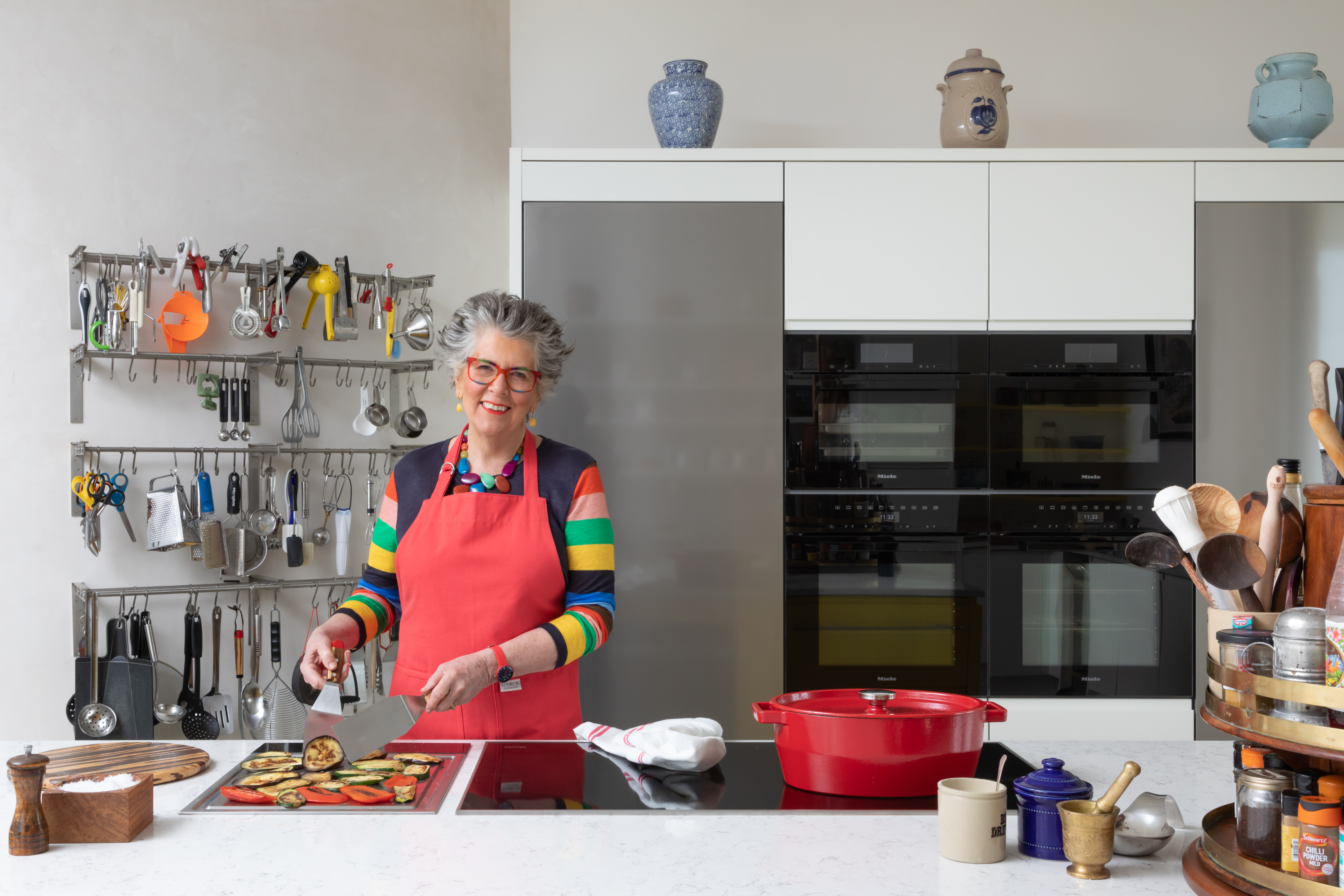 Paul Craig Interior Photographer, People Photography, Prue Leith cooking in her kitchen
